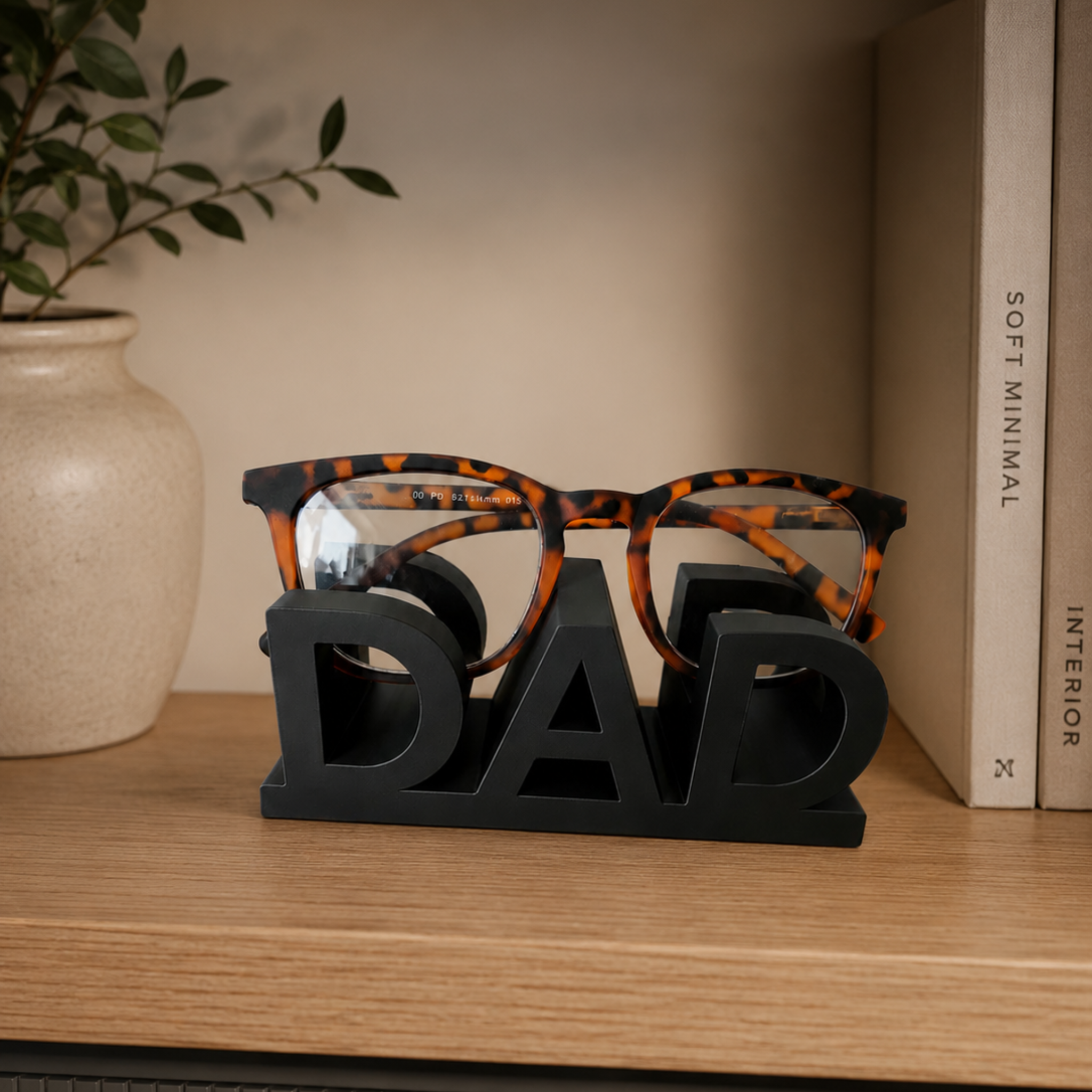 Brillenhouder "DAD"